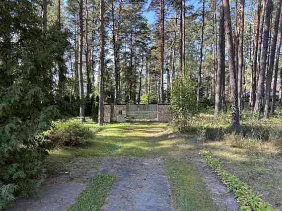 Private house in a scenic location with auxiliary buildings of various sizes and a large land plot.  Рижский район