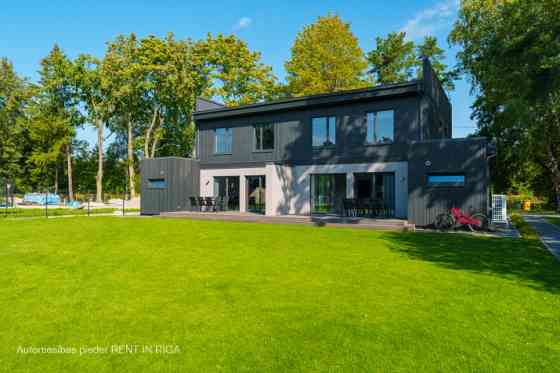 Новый, стильный и энергоэффективный двухсемейный дом в Юрмале.  Строительство Jūrmala