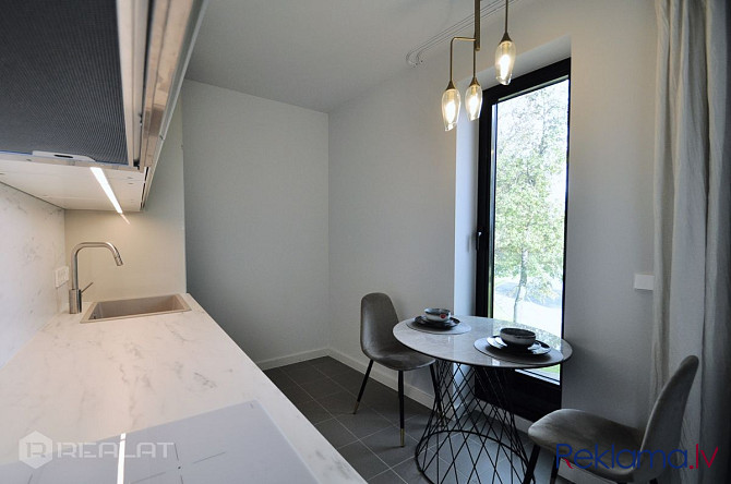 Kluss mēbelēts 3-istabu dzīvoklis (ar 2 guļamistabām) un terasi modernajā Garden Apartments Rīga - foto 6