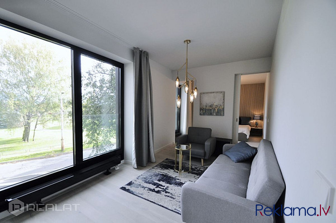 Kluss mēbelēts 3-istabu dzīvoklis (ar 2 guļamistabām) un terasi modernajā Garden Apartments Rīga - foto 3