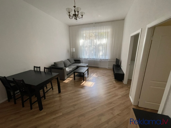 A furnished two-bedroom apartment in the very center of the city, which at the same time allows you  Рига - изображение 10
