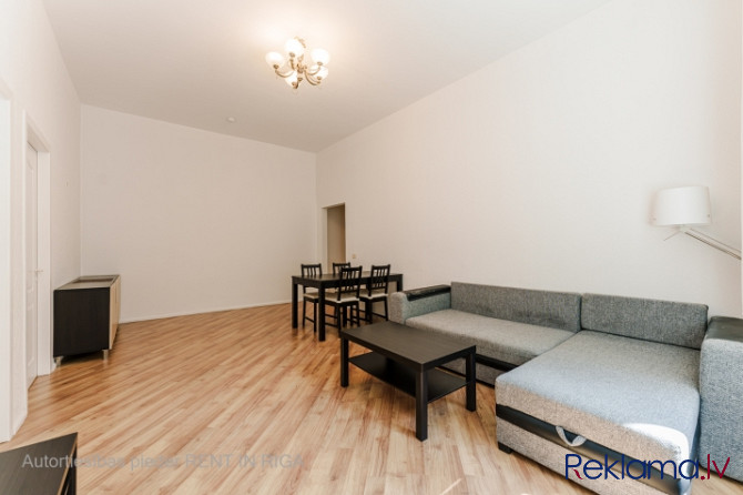 A furnished two-bedroom apartment in the very center of the city, which at the same time allows you  Рига - изображение 13