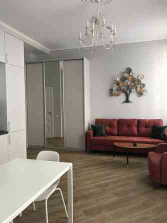 For long-term rent a brand new one bedroom apartment in a renovated building at the beginning of Avo Rīga