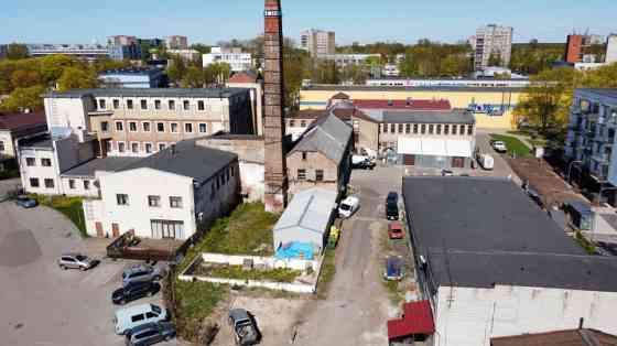 Viesnīca, noliktavas ēkas un teritorija Ķengaragā.  Būvju kopējā platība 7575 m2; Zemes gabalu kopēj Rīga