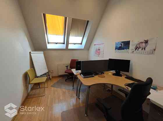 Со вкусом оформленный офис с живописным видом на Даугаву.  Общая площадь 341 м2. Рига