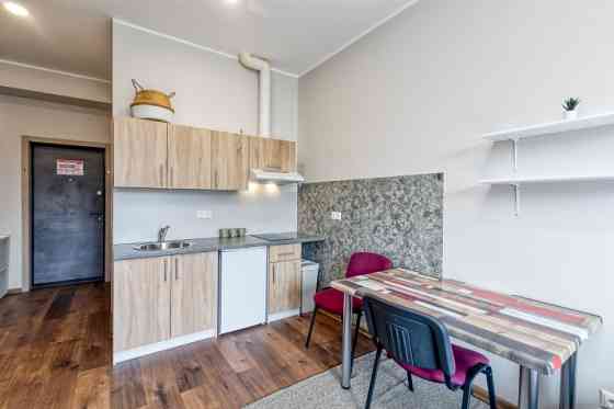 Available Now: Modern Studio Apartment in a Renovated Building  Step into a life of comfort and conv Rīga