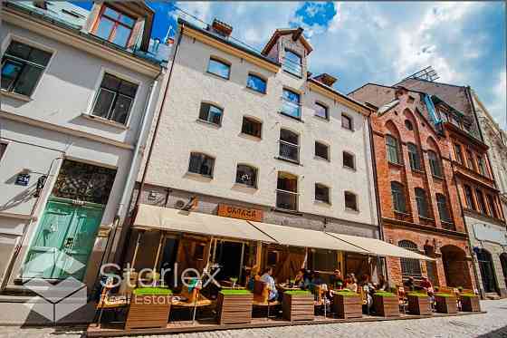 Продаю 2 смежных двухэтажных дома в центре Риги. Первый дом имеет два этажа и Rīga