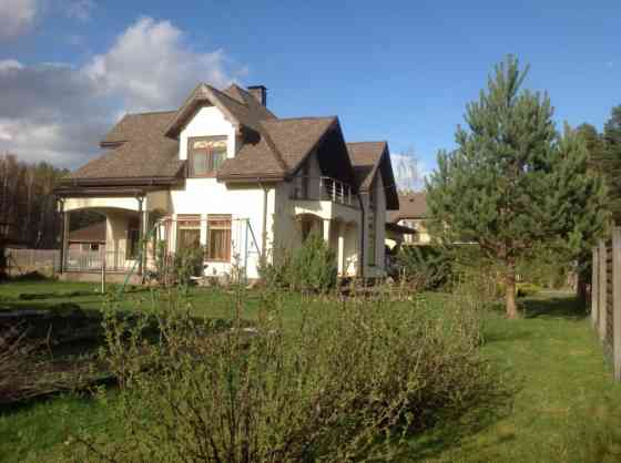 For sale a quality built family house with a reasonable layout located in a quiet, green village nea Рига