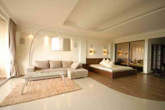 Эксклюзивные апартаменты класса Deluxe с большой террасой и панорамными окнами  - Рига