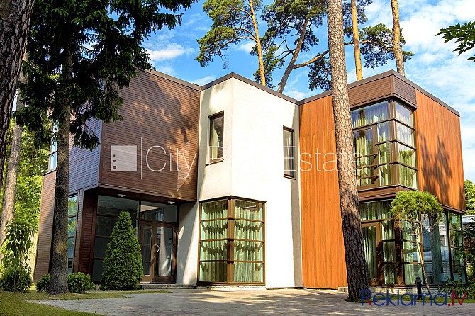 Фасадный дом, благоустроенная озеленённая территория, место для машины, стоянка Рига - изображение 14