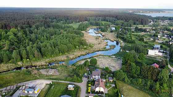 Pārdod apbūves zemi klusā vietā ar Langas upi un pretējo krastu īpašumā, kas ir garants, ka pretējā  Rīga