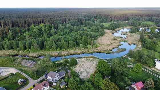 Pārdod apbūves zemi klusā vietā ar Langas upi un pretējo krastu īpašumā, kas ir garants, ka pretējā  Rīga