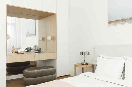 Продается 4-х комнатный таунхаус в новом проекте "Mežaparka Residences". Площадь дома 195 м2, + Рига