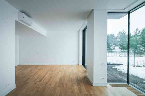 Продается 4-х комнатный таунхаус в новом проекте "Mežaparka Residences". Площадь дома 195 м2, + Рига