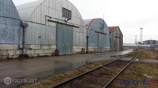 Nomai tiek piedāvāts siltināts angārs ar dzelzceļa pievadu.     Teritorija - lieliski Rīga - foto 3