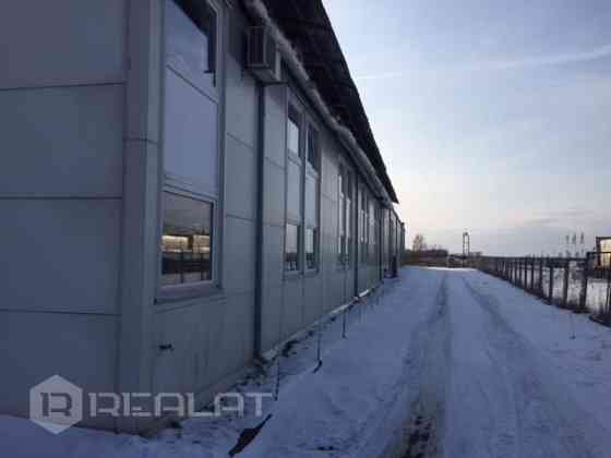 Iznomā plašas noliktāvas - ražošanas telpas  ar kopējo platību 6200 m2 kas atrodas 1,4 ha asfaltētā  Rīgas rajons