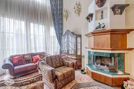 Изысканный дом, который мы предлагаем купить в Бергисе, включает в себя жилые Рига
