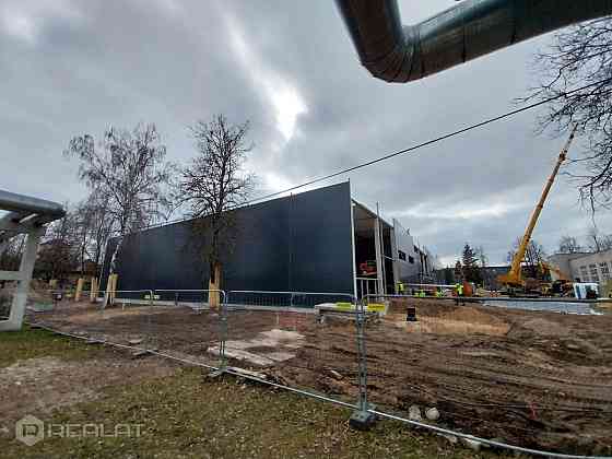 Iznomā A klases noliktavas / ražošanas telpas modernā biznesa centrā   + Ēka ir būvniecības stadijā  Рига