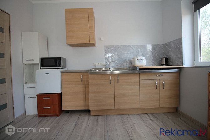 Laipni lūdzam jūsu jaunajā mājoklī - satriecošā modernā 2-istabu dzīvoklī, kas ideāli Rīga - foto 15