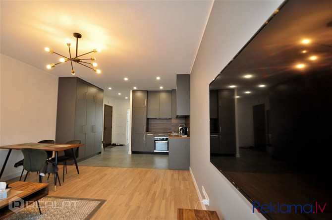 Laipni lūdzam jūsu jaunajā mājoklī - satriecošā modernā 2-istabu dzīvoklī, kas ideāli Rīga - foto 19