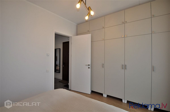 Laipni lūdzam jūsu jaunajā mājoklī - satriecošā modernā 2-istabu dzīvoklī, kas ideāli Rīga - foto 14