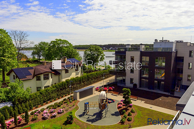 Новостройка, благоустроенный озеленённый двор, место для машины, балкон, Юрмала - изображение 9
