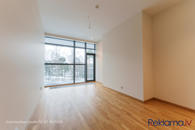 Apartamenti ar satreicošu panorāmas skatu un ar plašu terasi, unikālā projektā pašā Rīga - foto 5