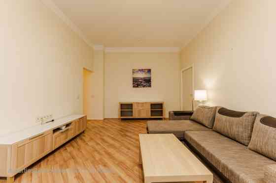 A furnished two-bedroom apartment in the very center of the city, which at the same time allows you  Рига