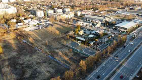 A land plot located along Kārļa Ulmaņa gatve, at the intersection with Gramzdas Street. Currently, a Рига