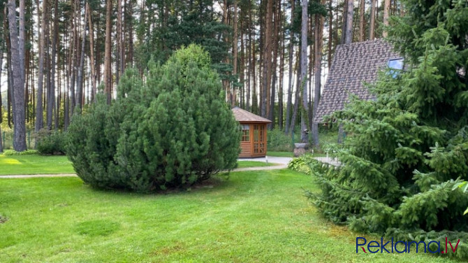 Tiek pārdota gaiša, omulīga, labi uzturēta māja ar kamīnu un tradicionālu koka guļbaļķu Jūrmala - foto 4