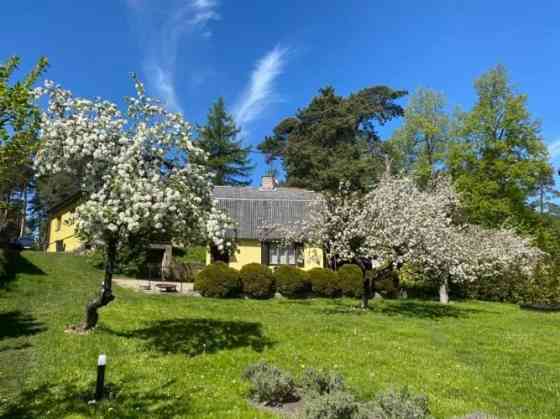 A house with a view towards the lake Mazais Baltezers and a beautiful, well-kept area of 1672 m! The Адажский округ