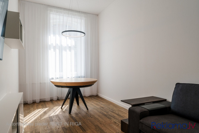 New and fresh two-bedroom apartment in the heart of the city. Fully furnished and equipped. The loca Рига - изображение 6