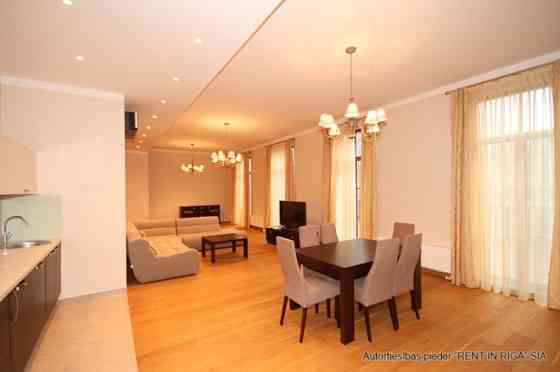 A two-story apartment with a spacious terrace is for sale. The apartment has three separate bedrooms Рига