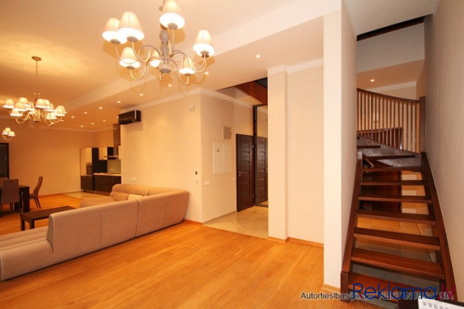 A two-story apartment with a spacious terrace is for sale. The apartment has three separate bedrooms Рига - изображение 5