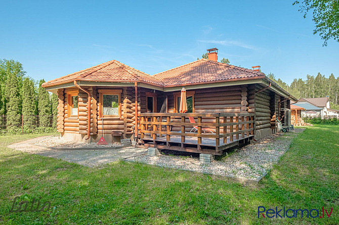 Pārdod skaistu vienstāva guļbūves māju ar iekoptu dārza teritoriju un saimniecības Salaspils - foto 1