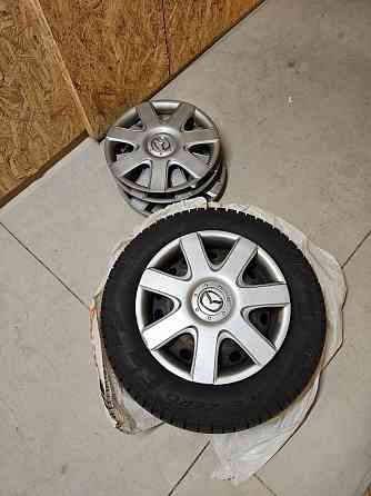 Metāla Diski 15" Mazda + Pirelli Ice Zero Ziemas Riepas (R15 195/65 94T) Rīga