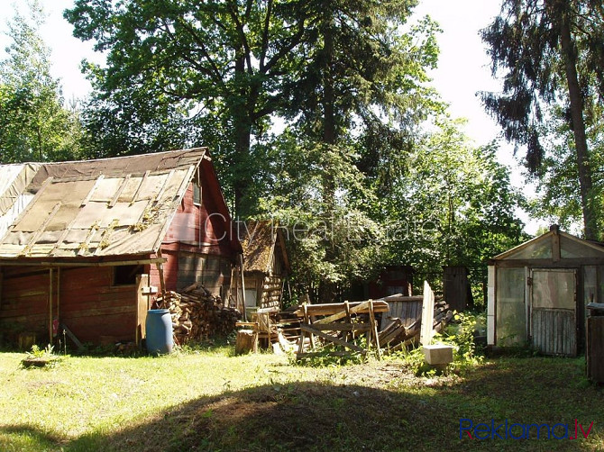 Покрытие крыши из черепицы, фасад с деревянной отделкой, территория обнесена Рижский район - изображение 13