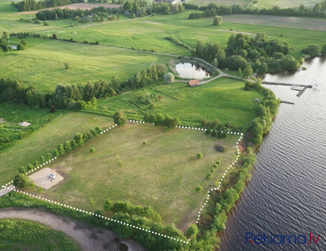 Piedāvājumā ekskluzīvs un estētisks īpašums Daugavas krastā!  Zemesgabals ar kopējo Daugavpils un Augšdaugavas novads - foto 2