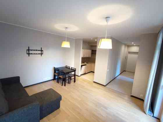 A modern, partially furnished 3-room apartment for rent in the new project on Alauksta street 9. The Rīga