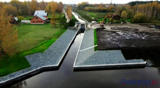 Apbūves gabals ainaviskā vietā blakus Gaujas upei ar savu individuālu kanālu, kurš ietek Ādažu novads - foto 4