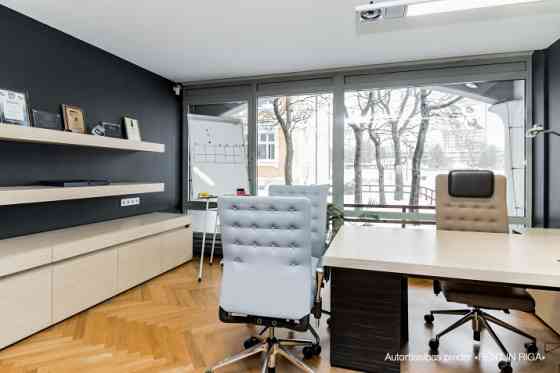 Furnished and fully equipped office in a renovated historic wooden building next to Zunda Towers.  T Rīga